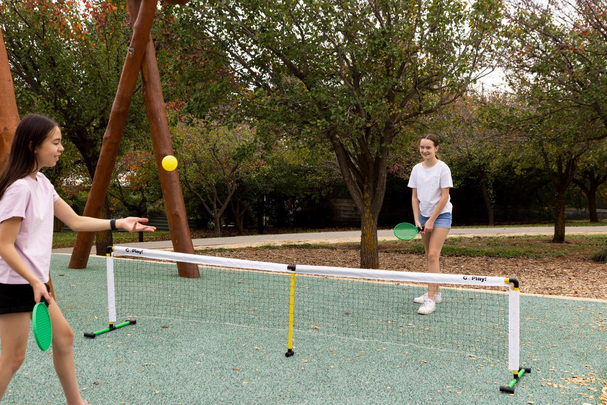 Go Play! Racquet / Soccer Tennis Set in action, 2 girls playing tennis